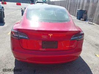 2021 Tesla Model 3 Long Range with VIN 5YJ3E1EBXMF928002, listed as a IAAI auction lot 42003092 with 25,867 mi miles. Bid and sale history available at carsss.com. Image 14.