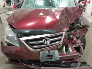 2007 Honda Odyssey EX-L with VIN 5FNRL38607B129361, listed as a IAAI auction lot 41778611 with Not Provided miles and . Bid and sale history available at carsss.com. Image 10.