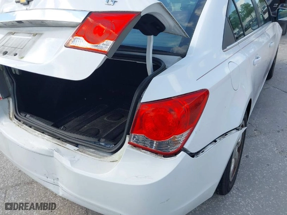 2015 Chevrolet Cruze LT with VIN 1G1PC5SB2F7215969, listed as a IAAI auction lot 42044201 with 104,537 mi miles. Bid and sale history available at carsss.com. Image 12.