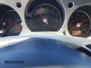 2007 Nissan 350Z Enthusiast z VIN JN1BZ34D87M504265, wystawiony jako Copart lot #56251655 z przebiegiem 141 350 mil mil oraz Szkoda całkowita • Salvage title. Historia ofert i sprzedaży dostępna na DreamBid. Obrazek 9.
