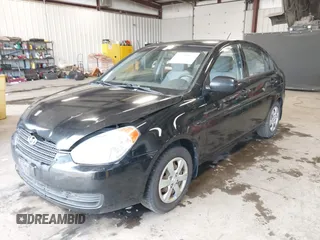 2011 Hyundai Accent GLS z VIN KMHCN4AC1BU620314, wystawiony jako IAAI lot #42228847 z przebiegiem 144 313 mil mil oraz . Historia ofert i sprzedaży dostępna na DreamBid. Obrazek 2.
