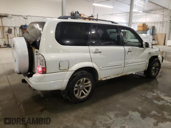 2004 Suzuki XL7 LX with VIN JS3TX92V044106650, listed as a Copart auction lot 76285514 with 185,356 mi miles and Salvage title. Bid and sale history available at DreamBid. Image 3.