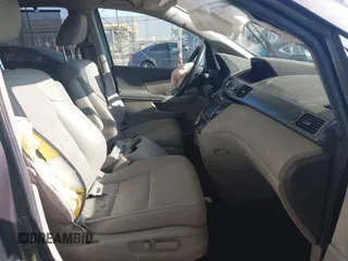 2014 Honda Odyssey EX-L with VIN 5FNRL5H61EB079742, listed as a IAAI auction lot 41992473 with 125,397 mi miles and . Bid and sale history available at carsss.com. Image 5.