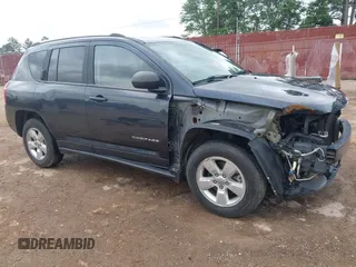 2014 Jeep Compass Sport with VIN 1C4NJCBA1ED725875, listed as a IAAI auction lot 42118863 with 133,136 mi miles. Bid and sale history available at carsss.com. Image 1.