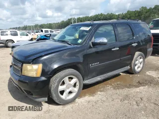 2007 Chevrolet Tahoe LTZ with VIN 1GNFC13087R350220, listed as a Copart auction lot 61231045 with 234,559 mi miles and Salvage title. Bid and sale history available at DreamBid. Image 1.