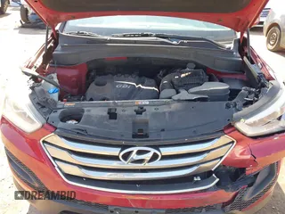 2014 Hyundai Santa Fe with VIN 5XYZT3LB1EG134837, listed as a IAAI auction lot 42454126 with 118,225 mi miles and . Bid and sale history available at DreamBid. Image 10.