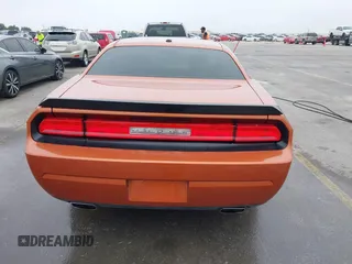 2011 Dodge Challenger z VIN 2B3CJ4DG9BH602419, wystawiony jako IAAI lot #40753257 z przebiegiem 124 282 mil mil oraz . Historia ofert i sprzedaży dostępna na DreamBid. Obrazek 16.