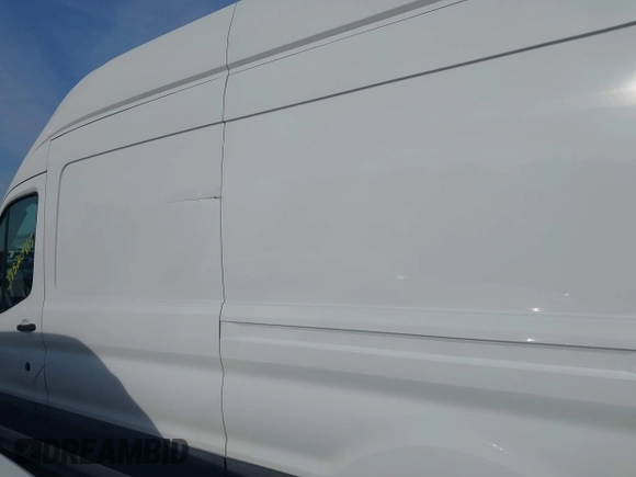 2017 Ford Transit Cargo with VIN 1FTBW3XG9HKA80524, listed as a IAAI auction lot 37520715 with 98,524 mi miles. Bid and sale history available at carsss.com. Image 14.