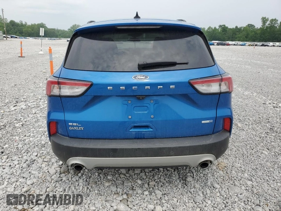 2020 Ford Escape SEL с VIN 1FMCU9H60LUB42789, выставлен на аукционе Copart как лот 59349045 с пробегом 84 712 миль миль и Списание • Salvage title. История ставок и продаж доступна на DreamBid. Изображение 6.