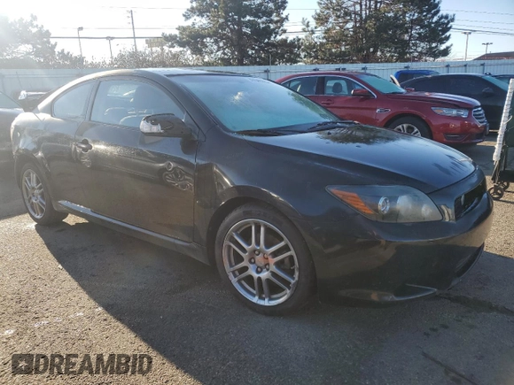 2009 Scion tC z VIN JTKDE167090278867, wystawiony jako Copart lot #47040775 z przebiegiem 148 976 mil mil oraz Szkoda całkowita • Salvage title. Historia ofert i sprzedaży dostępna na DreamBid. Obrazek 4.