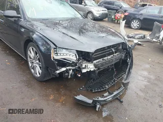 2012 Audi A8 L with VIN WAURVAFD8CN006917, listed as a IAAI auction lot 40877090 with 144,387 mi miles. Bid and sale history available at carsss.com. Image 6.