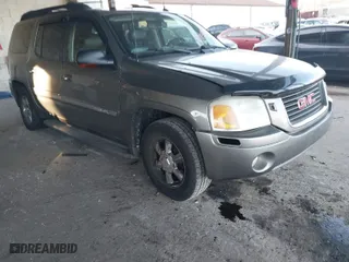 2005 GMC Envoy XL SLT with VIN 1GKET16S556177504, listed as a IAAI auction lot 41307581 with NaN miles. Bid and sale history available at carsss.com. Image 1.