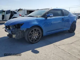 2015 Scion tC z VIN JTKJF5C76FJ000587, wystawiony jako Copart lot #51789295 z przebiegiem 98 139 mil mil oraz Szkoda całkowita • Salvage title. Historia ofert i sprzedaży dostępna na DreamBid. Obrazek 1.