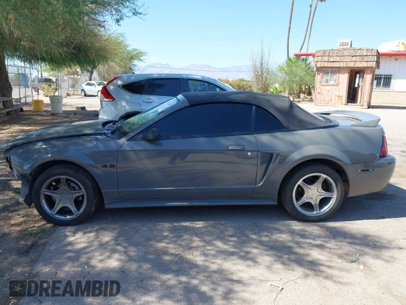 1999 Ford Mustang GT z VIN 1FAFP45X4XF117368, wystawiony jako IAAI lot #42714841 z przebiegiem 135 368 mil mil oraz . Historia ofert i sprzedaży dostępna na DreamBid. Obrazek 15.