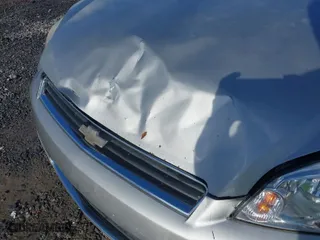 2008 Chevrolet Impala LT with VIN 2G1WT55N989163212, listed as a IAAI auction lot 41496042 with 276,259 mi miles. Bid and sale history available at carsss.com. Image 6.