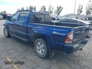 2015 Toyota Tacoma with VIN 3TMMU4FN0FM077148, listed as a IAAI auction lot 41274934 with 112,617 mi miles and . Bid and sale history available at DreamBid. Image 3.