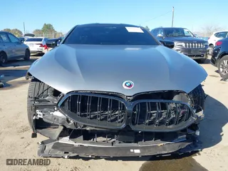 2023 BMW M8 Competition with VIN WBSAE0C0XPCM48877, listed as a IAAI auction lot 41676318 with 18,572 mi miles. Bid and sale history available at carsss.com. Image 13.