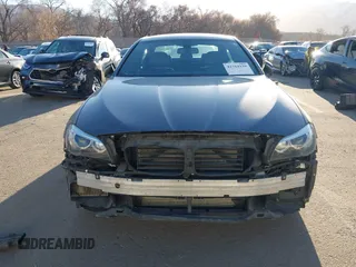 2015 BMW 5 Series 535i xDrive with VIN WBA5B3C58FD547704, listed as a IAAI auction lot 41764129 with 152,649 mi miles. Bid and sale history available at carsss.com. Image 13.