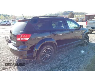 2018 Dodge Journey SE z VIN 3C4PDCAB9JT243816, wystawiony jako IAAI lot #41982817 z przebiegiem 173 092 mil mil oraz . Historia ofert i sprzedaży dostępna na DreamBid. Obrazek 4.