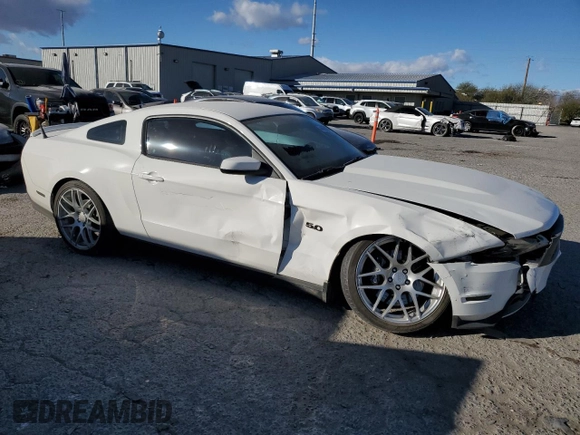 2012 Ford Mustang GT Premium with VIN 1ZVBP8CF1C5266585, listed as a Copart auction lot 44407035 with 71,651 mi miles and Salvage Title. Bid and sale history available at DreamBid. Image 4.