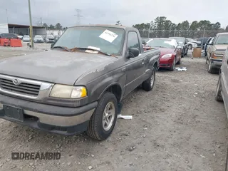 2000 Mazda B-Series Truck SX with VIN 4F4YR12C9YTM23599, listed as a IAAI auction lot 41393276 with 232,789 mi miles and . Bid and sale history available at DreamBid. Image 2.