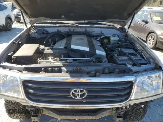 2002 Toyota Land Cruiser with VIN JTEHT05J122027769, listed as a Copart auction lot 76518004 with 151,767 mi miles and Salvage Title. Bid and sale history available at carsss.com. Image 12.