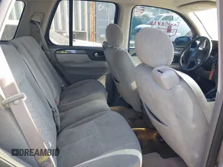 2005 GMC Envoy SLT with VIN 1GKDS13SX52175970, listed as a IAAI auction lot 42047871 with 205,432 mi miles. Bid and sale history available at carsss.com. Image 8.
