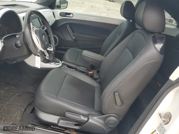 2019 Volkswagen Beetle SE with VIN 3VWJD7AT4KM710591, listed as a Copart auction lot 63178804 with 56,722 mi miles and Salvage Title. Bid and sale history available at carsss.com. Image 7.