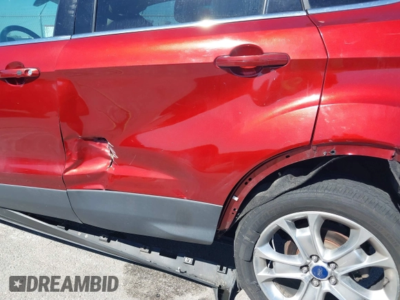 2015 Ford Escape Titanium with VIN 1FMCU9J92FUA53699, listed as a IAAI auction lot 40500310 with 197,581 mi miles. Bid and sale history available at carsss.com. Image 19.