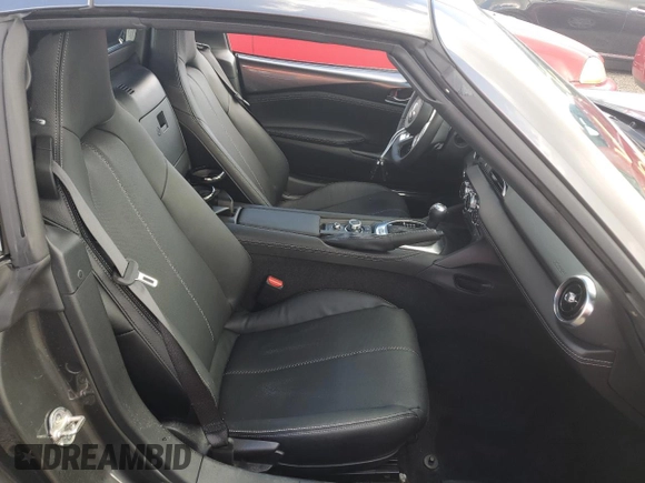 2024 Mazda MX-5 Miata Grand Touring z VIN JM1NDAM73R0603254, wystawiony jako Copart lot #74551704 z przebiegiem Nie podano mil oraz Nie do naprawy • Non repairable. Historia ofert i sprzedaży dostępna na DreamBid. Obrazek 10.