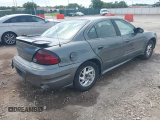 2004 Pontiac Grand Am SE1 with VIN 1G2NF52E64C257019, listed as a IAAI auction lot 42248217 with 164,581 mi miles and . Bid and sale history available at DreamBid. Image 4.