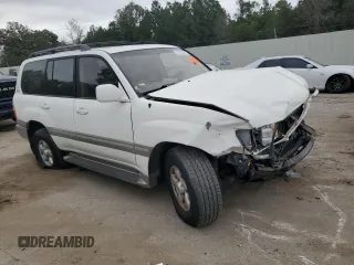 2000 Toyota Land Cruiser with VIN JT3HT05J9Y0101498, listed as a Copart auction lot 76126734 with 173,138 mi miles and Salvage Title. Bid and sale history available at carsss.com. Image 4.