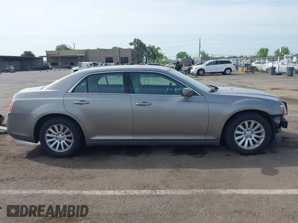 2014 Chrysler 300 with VIN 2C3CCAAG3EH322855, listed as a IAAI auction lot 42053129 with 172,687 mi miles. Bid and sale history available at carsss.com. Image 14.