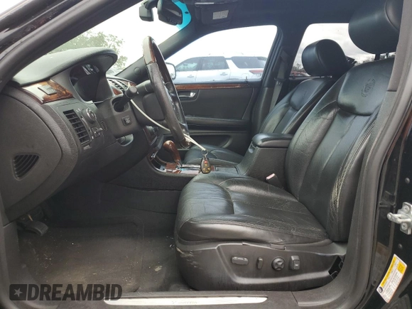2007 Cadillac DTS Performance with VIN 1G6KD57927U137574, listed as a Copart auction lot 45365595 with 133,935 mi miles and Salvage Title. Bid and sale history available at carsss.com. Image 7.