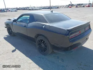 2017 Dodge Challenger SXT Plus with VIN 2C3CDZAG9HH501594, listed as a IAAI auction lot 41628513 with 151,399 mi miles. Bid and sale history available at carsss.com. Image 3.