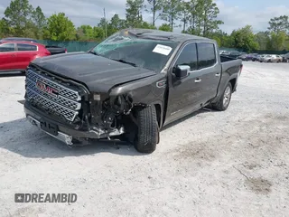2019 GMC Sierra 1500 Denali z VIN 1GTU9FEL8KZ180128, wystawiony jako IAAI lot #42028488 z przebiegiem 78 015 mil mil oraz . Historia ofert i sprzedaży dostępna na DreamBid. Obrazek 2.