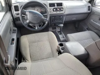 2001 Nissan Xterra XE with VIN 5N1ED28T71C595011, listed as a Copart auction lot 83204354 with Not Provided miles and Salvage Title. Bid and sale history available at DreamBid. Image 8.
