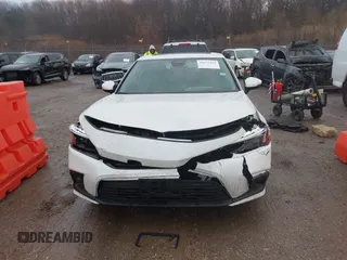 2023 Honda Civic Touring z VIN 2HGFE1F93PH304731, wystawiony jako IAAI lot #41675935 z przebiegiem 27 435 mil mil oraz . Historia ofert i sprzedaży dostępna na DreamBid. Obrazek 12.