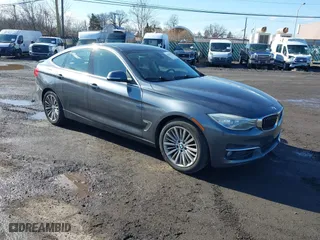 2015 BMW 3 Series Gran Turismo 328i xDrive with VIN WBA3X5C53FD561711, listed as a IAAI auction lot 41523054 with 168,902 mi miles. Bid and sale history available at carsss.com. Image 1.