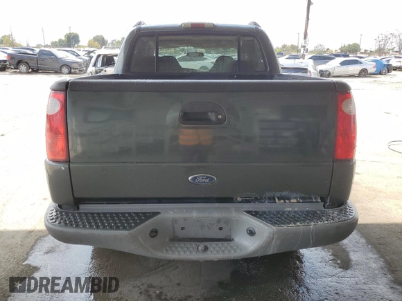 2002 Ford Explorer Sport Trac Value with VIN 1FMZU67E72UC81009, listed as a Copart auction lot 54929835 with 130,862 mi miles and Salvage title. Bid and sale history available at DreamBid. Image 6.
