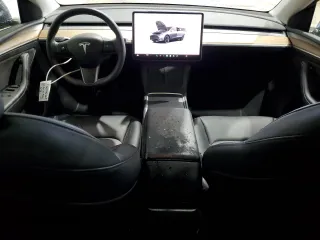 2023 Tesla Model Y Long Range z VIN 7SAYGDEE8PF814874, wystawiony jako Copart lot #56546365 z przebiegiem 20 919 mil mil oraz Szkoda całkowita • Salvage title. Historia ofert i sprzedaży dostępna na DreamBid. Obrazek 8.