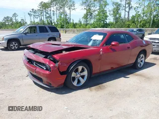 2017 Dodge Challenger SXT z VIN 2C3CDZAG8HH568476, wystawiony jako IAAI lot #42334027 z przebiegiem 161 515 mil mil oraz . Historia ofert i sprzedaży dostępna na DreamBid. Obrazek 2.