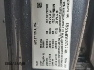 2023 Tesla Model 3 with VIN 5YJ3E1EA3PF672023, listed as a Copart auction lot 57571645 with 18,115 mi miles and Salvage title. Bid and sale history available at DreamBid. Image 12.