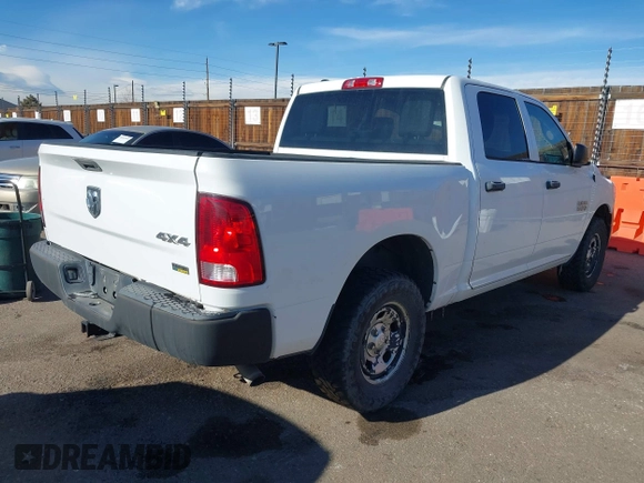 2015 Ram 1500 Tradesman with VIN 1C6RR7KG5FS660748, listed as a IAAI auction lot 41403779 with 201,127 mi miles and . Bid and sale history available at DreamBid. Image 4.