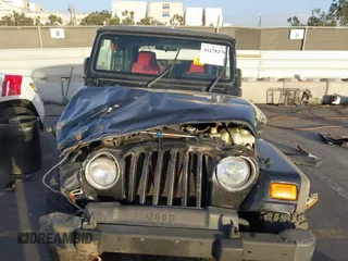 2005 Jeep Wrangler Unlimited with VIN 1J4FA44S35P314941, listed as a IAAI auction lot 41278276 with 248,865 mi miles. Bid and sale history available at carsss.com. Image 11.