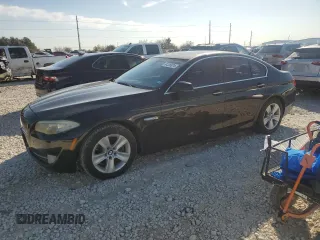 2012 BMW 5 Series 528i with VIN WBAXG5C55CDY30322, listed as a Copart auction lot 84326974 with 210,301 mi miles and Clean Title. Bid and sale history available at carsss.com. Image 1.