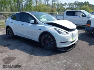 2022 Tesla Model Y Performance with VIN 7SAYGDEF2NF379209, listed as a IAAI auction lot 41917918 with 34,166 mi miles. Bid and sale history available at carsss.com. Image 1.