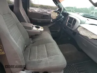 2003 Ford F-150 XL with VIN 1FTRF07W33KB56591, listed as a Copart auction lot 64170993 with 150,941 mi miles and Salvage title. Bid and sale history available at DreamBid. Image 10.