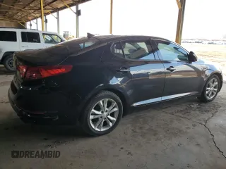 2013 Kia Optima EX z VIN 5XXGN4A75DG253693, wystawiony jako Copart lot #59227785 z przebiegiem 191 062 mil mil oraz Szkoda całkowita • Salvage title. Historia ofert i sprzedaży dostępna na DreamBid. Obrazek 3.