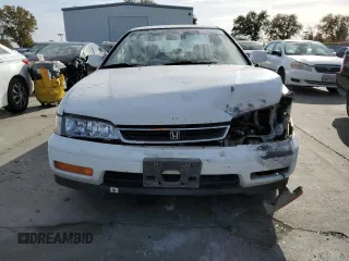 1994 Honda Accord LX with VIN 1HGCD7239RA023822, listed as a Copart auction lot 77522983 with 244,934 mi miles and Salvage Title. Bid and sale history available at carsss.com. Image 5.